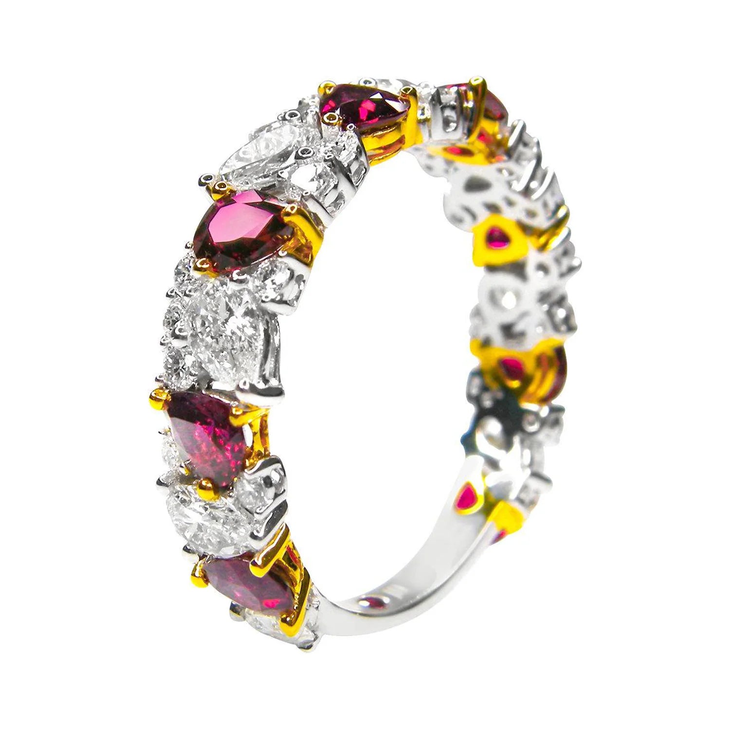Side view of a 3/4 ruby and diamond ring showing the pear-cut setting