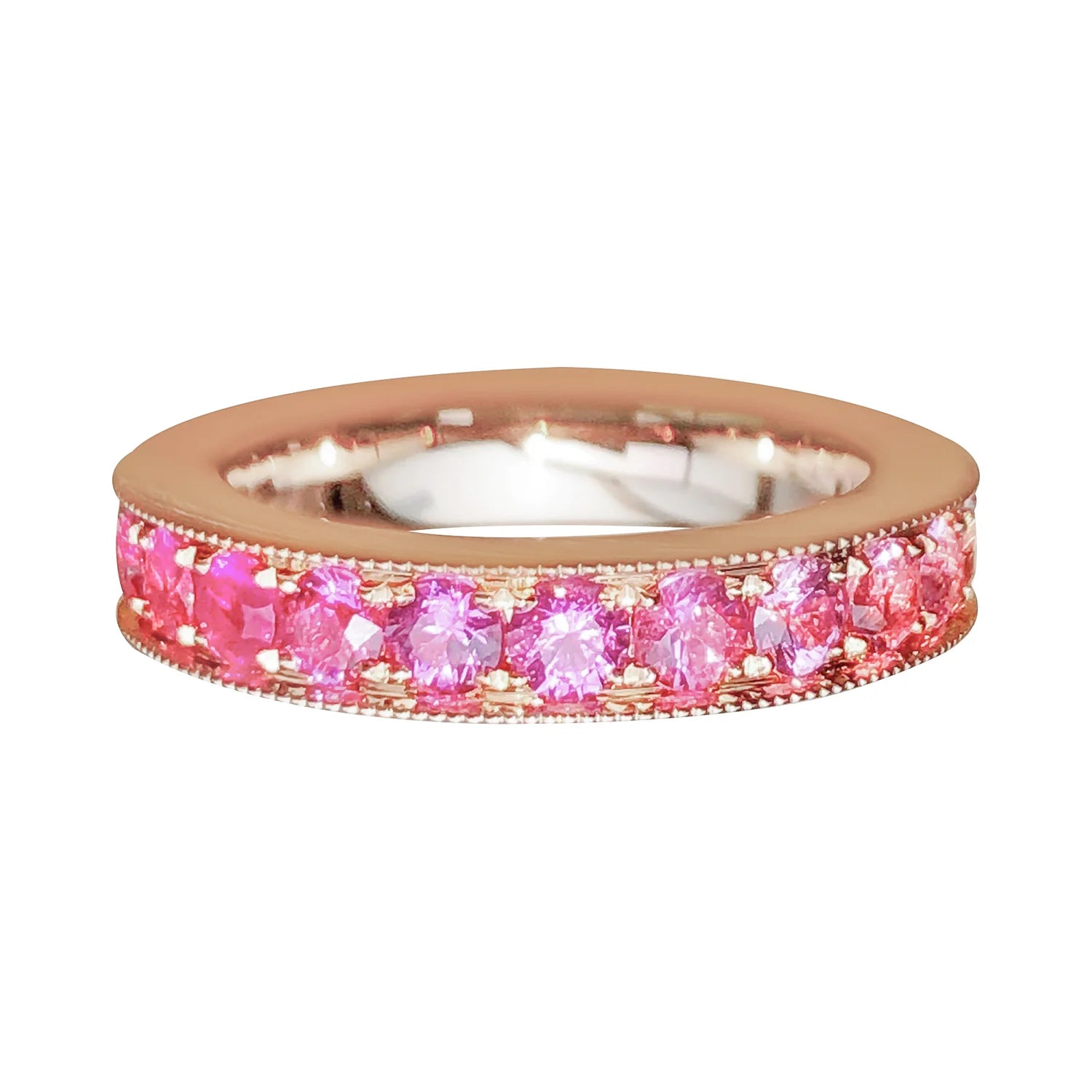 Ring with pink gemstones on a white background