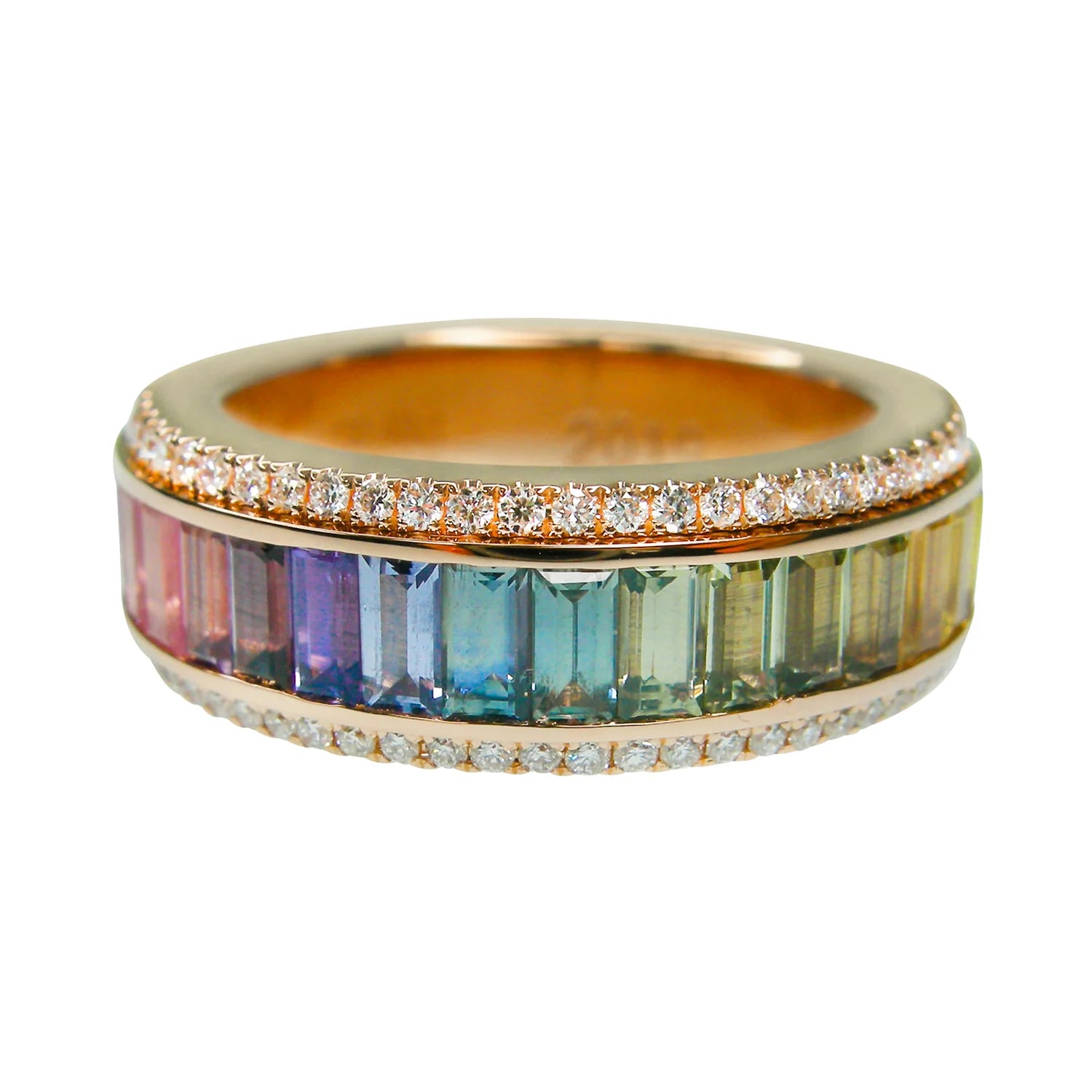 Gold ring with multicolored gemstones and diamonds on a white background