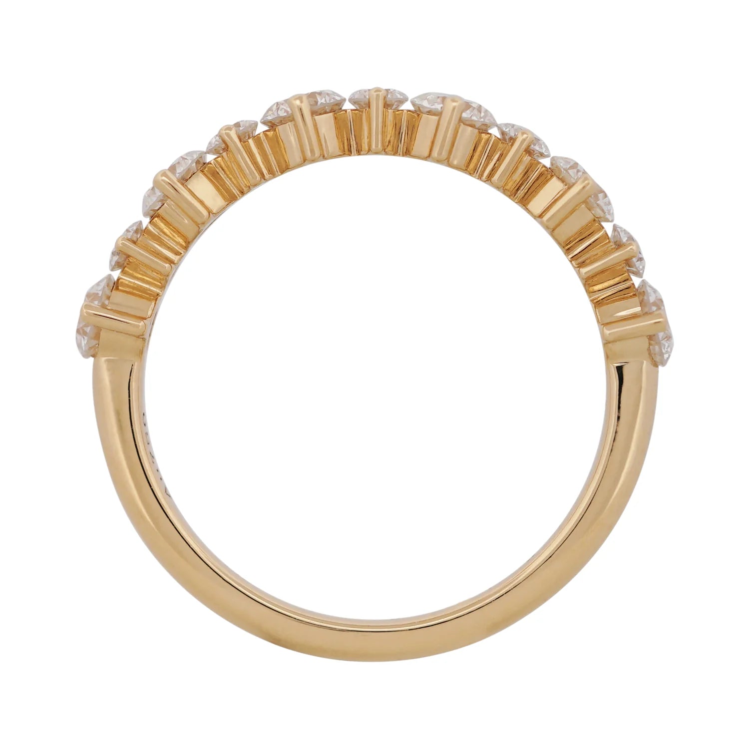 Gold ring with embedded diamonds on a white background