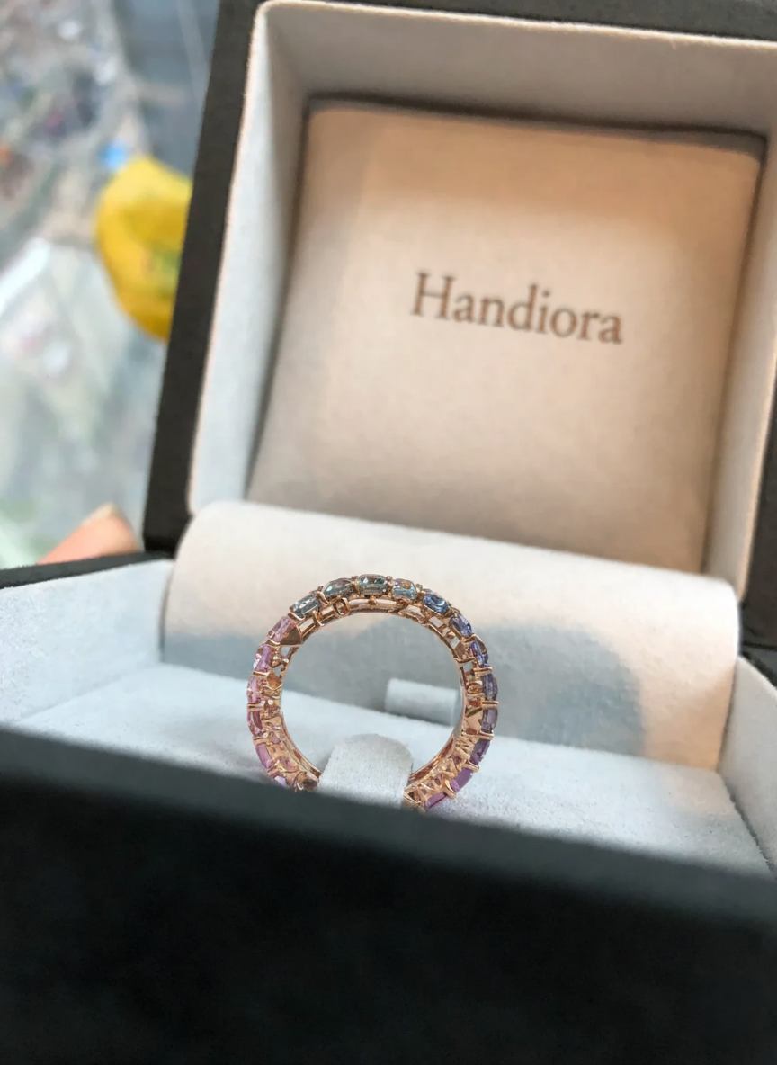 Ring with colorful stones in a 'Handiora' box