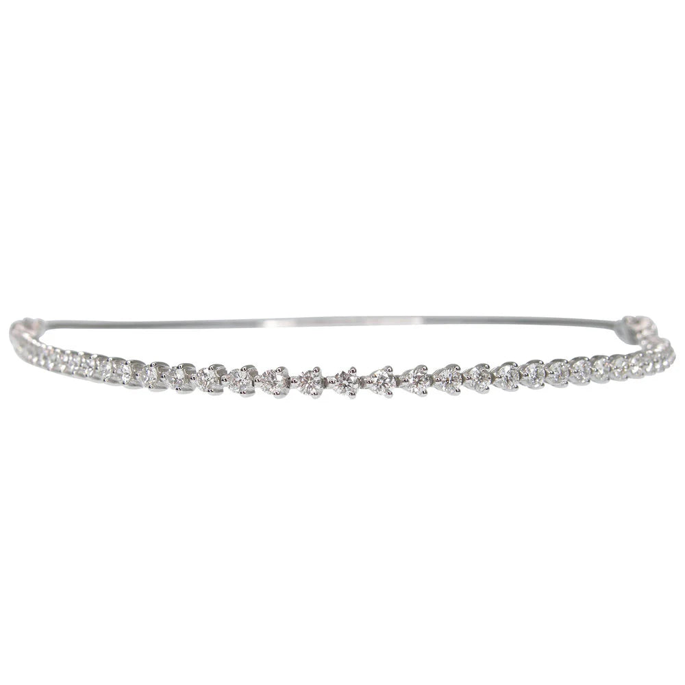 Silver tiara with small diamonds on a white background