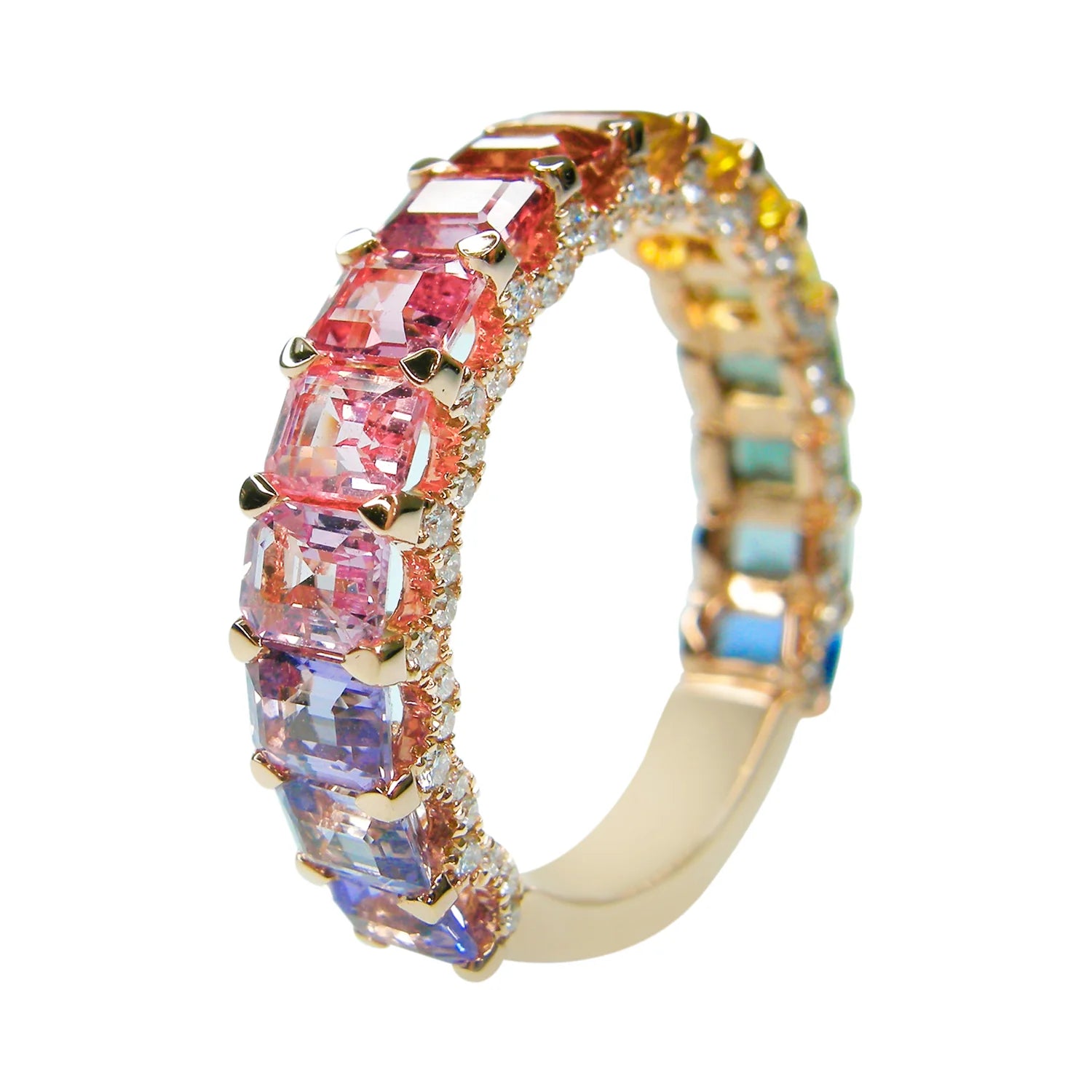 Multicolored gemstone ring with gold accents on a white background
