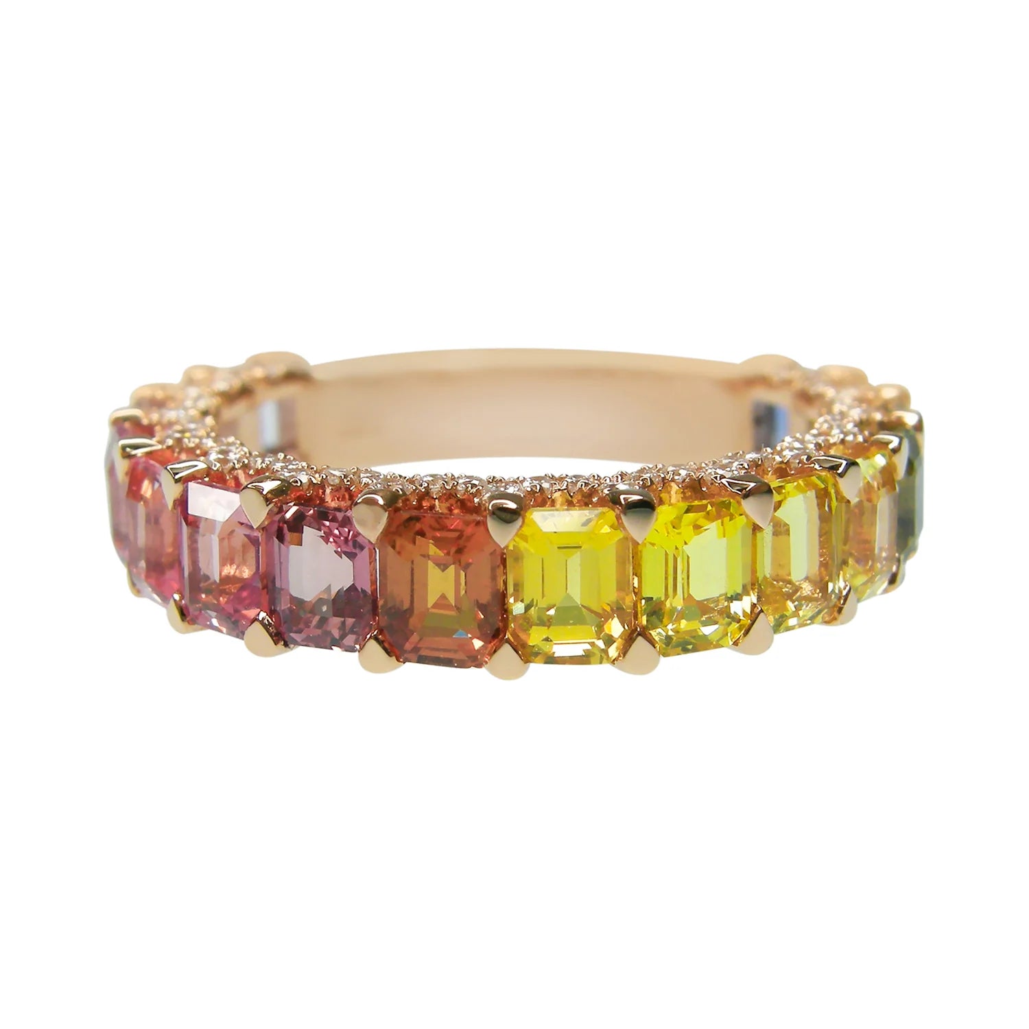 Ring with multicolored gemstones on a white background