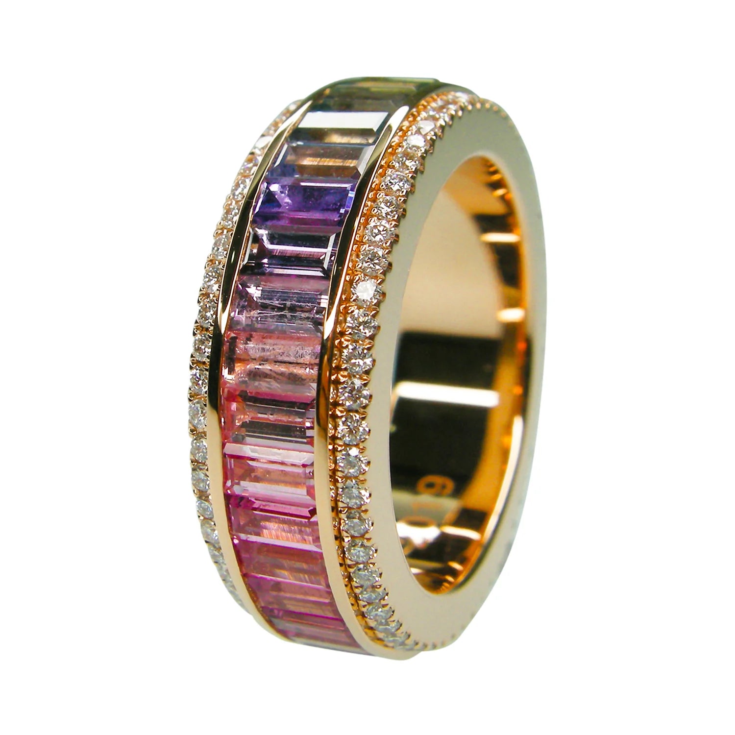 Gold ring with colorful gemstones and diamonds on a white background