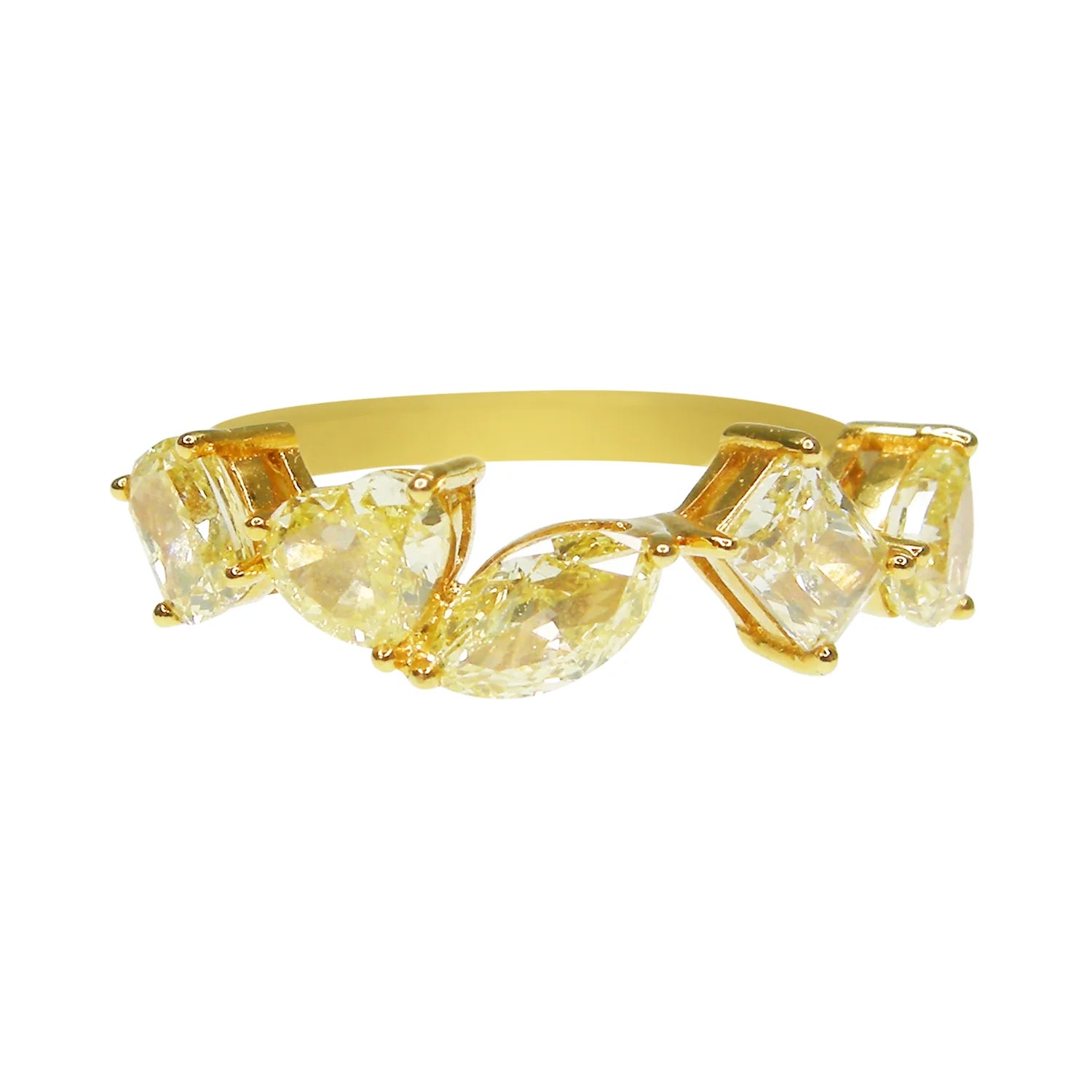 Gold ring with yellow gemstones on a white background