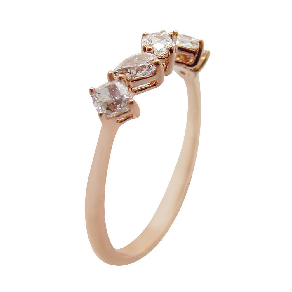 Rose gold ring with four diamonds on a white background