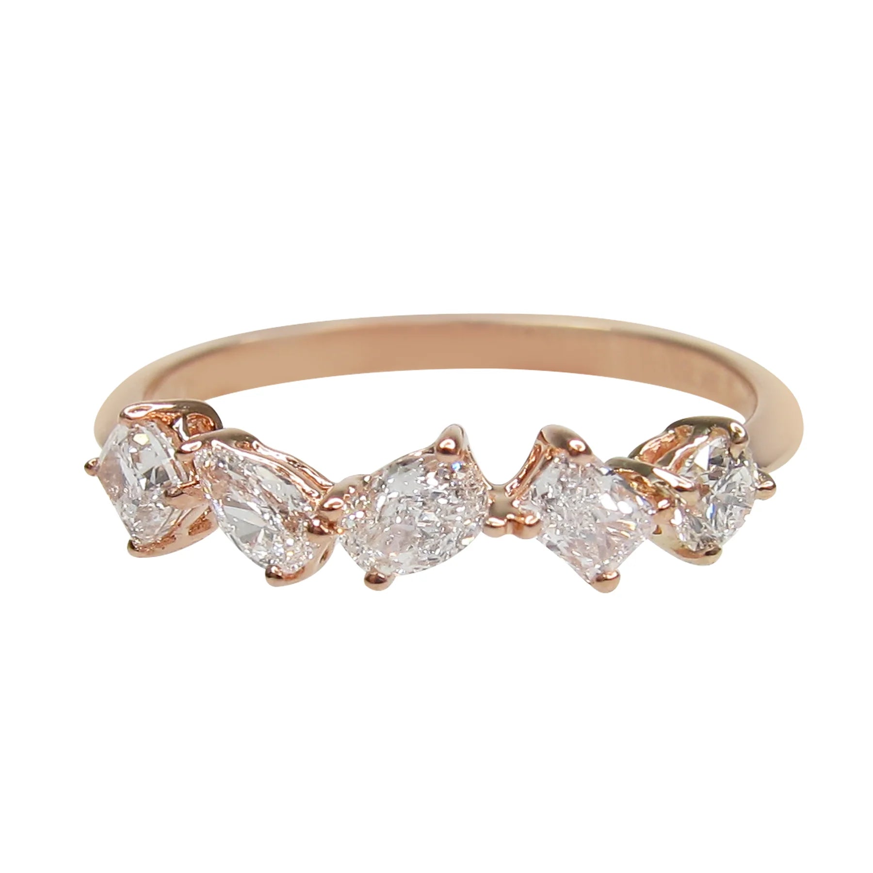 Rose gold ring with five pear-shaped diamonds on a white background