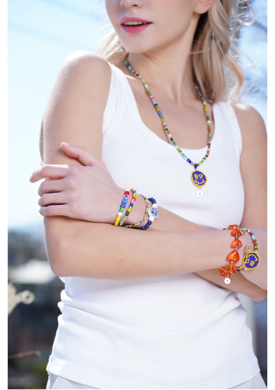 Bonbo bracelet with shiny glass beads on white background