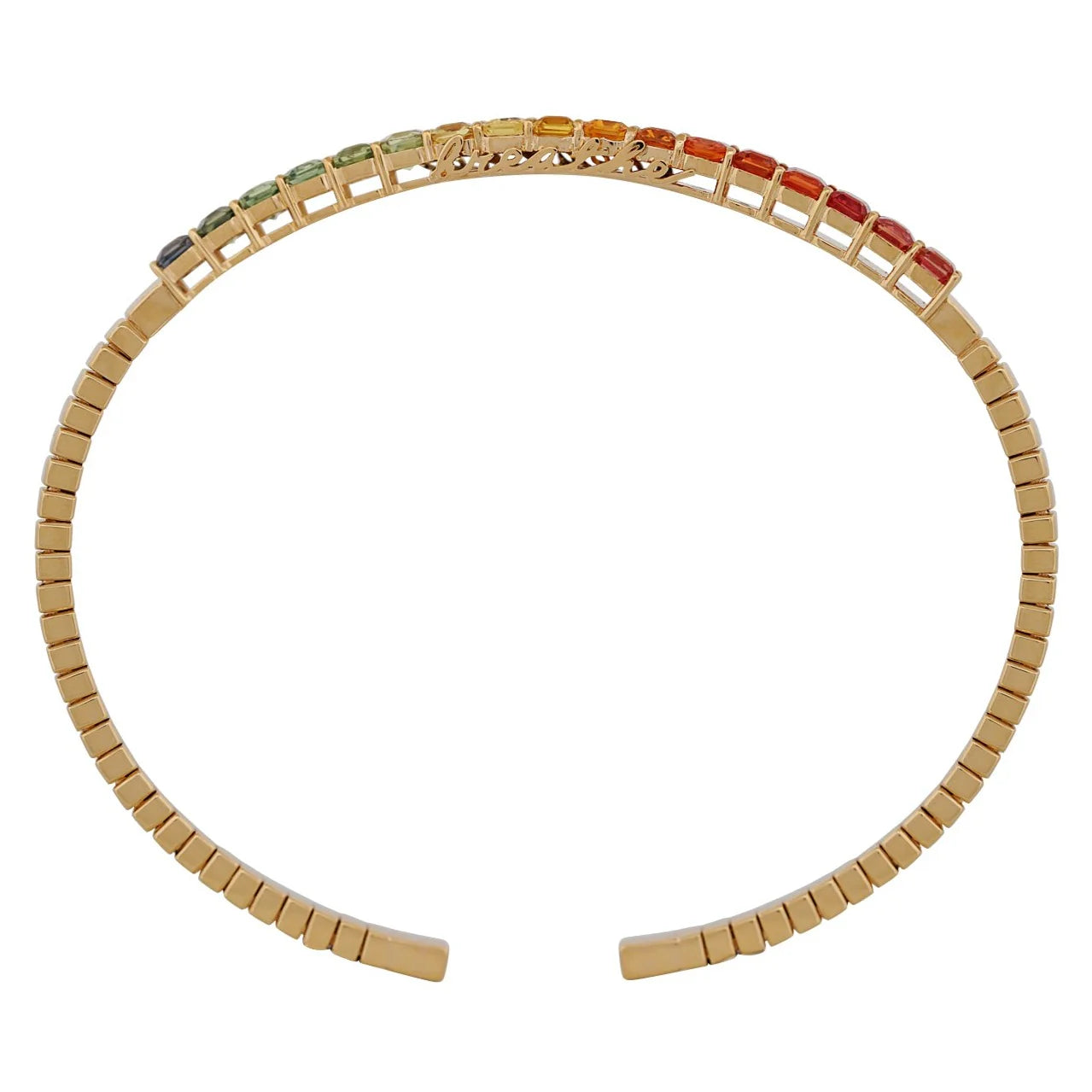 Gold necklace with multicolored stones on a white background