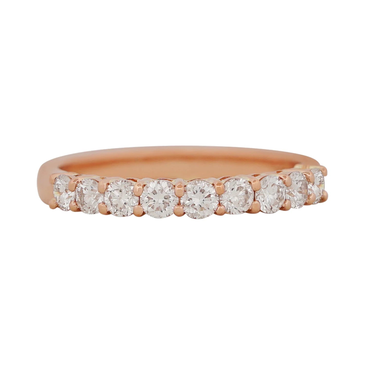 Rose gold ring with diamonds on a white background