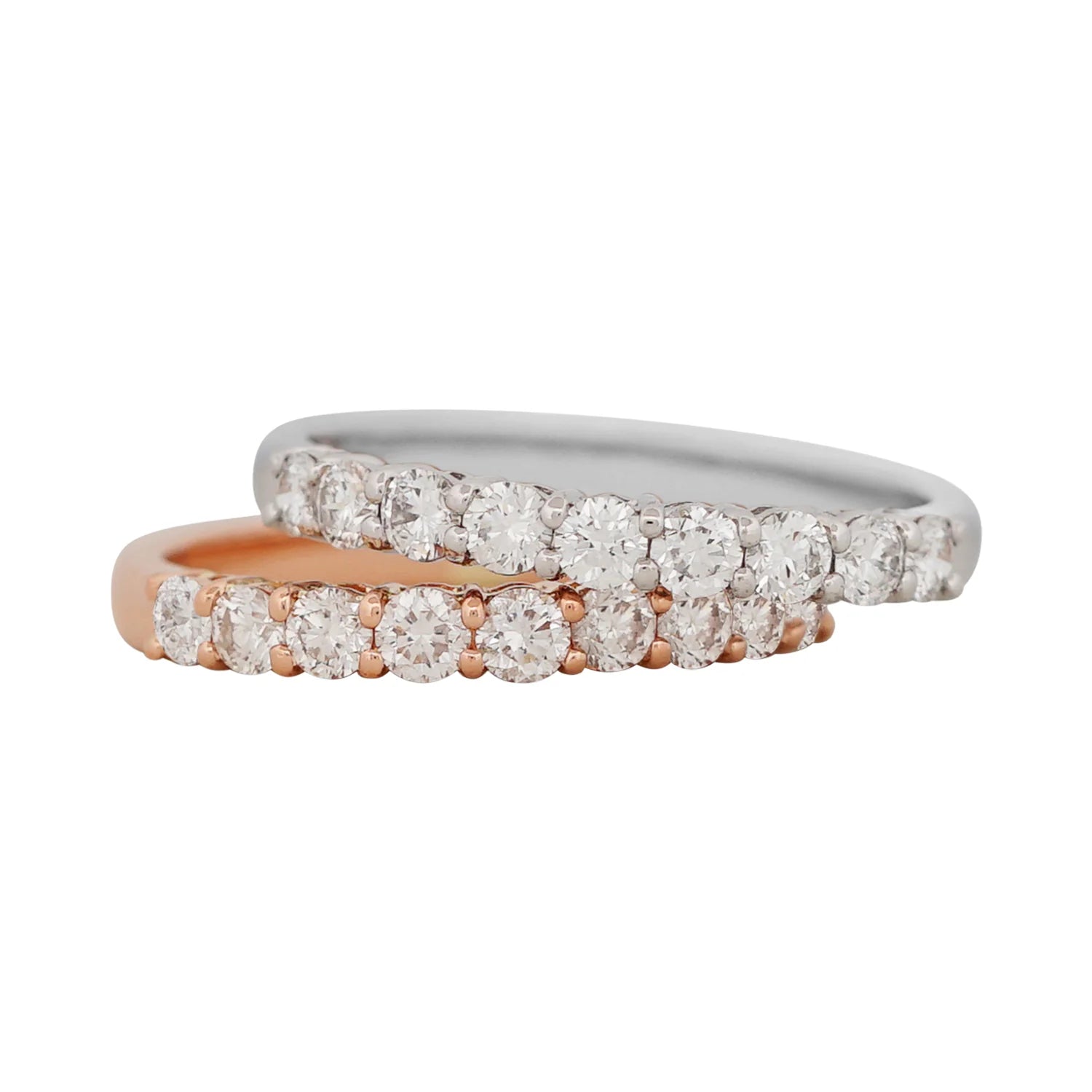 Two diamond rings with rose gold and silver bands on a white background