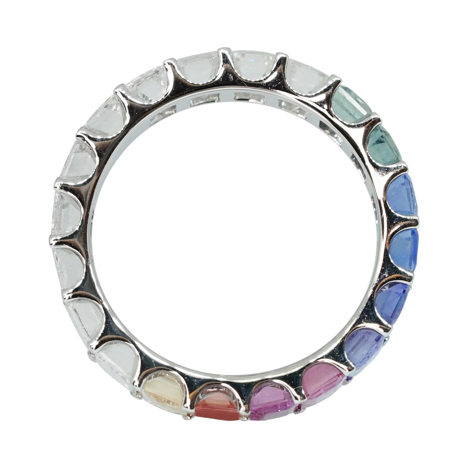 Silver ring with multicolored gemstones on a white background