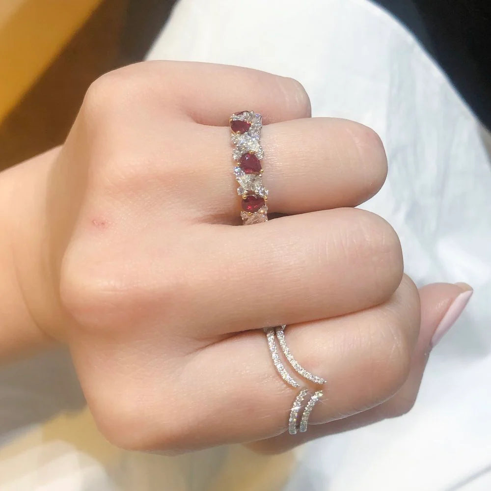 Ruby and diamond 3/4 ring stacked with a bridal set