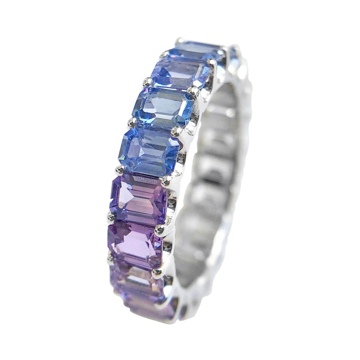 Side view of Yin Yang eternity band showing diamonds and rainbow sapphires