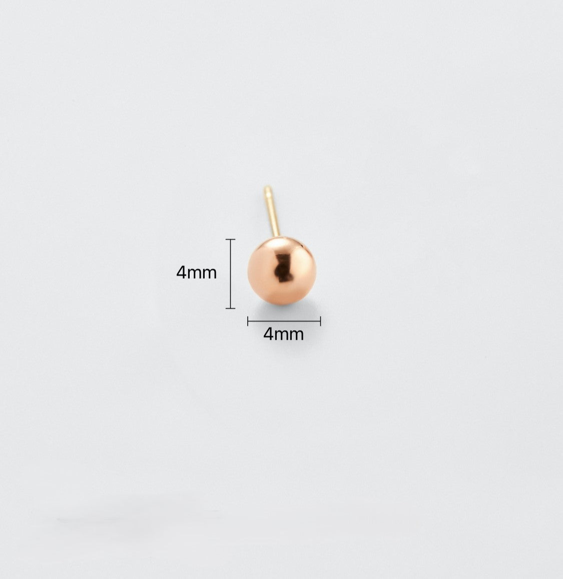 Model wearing 14K gold ball stud earrings – Handiora