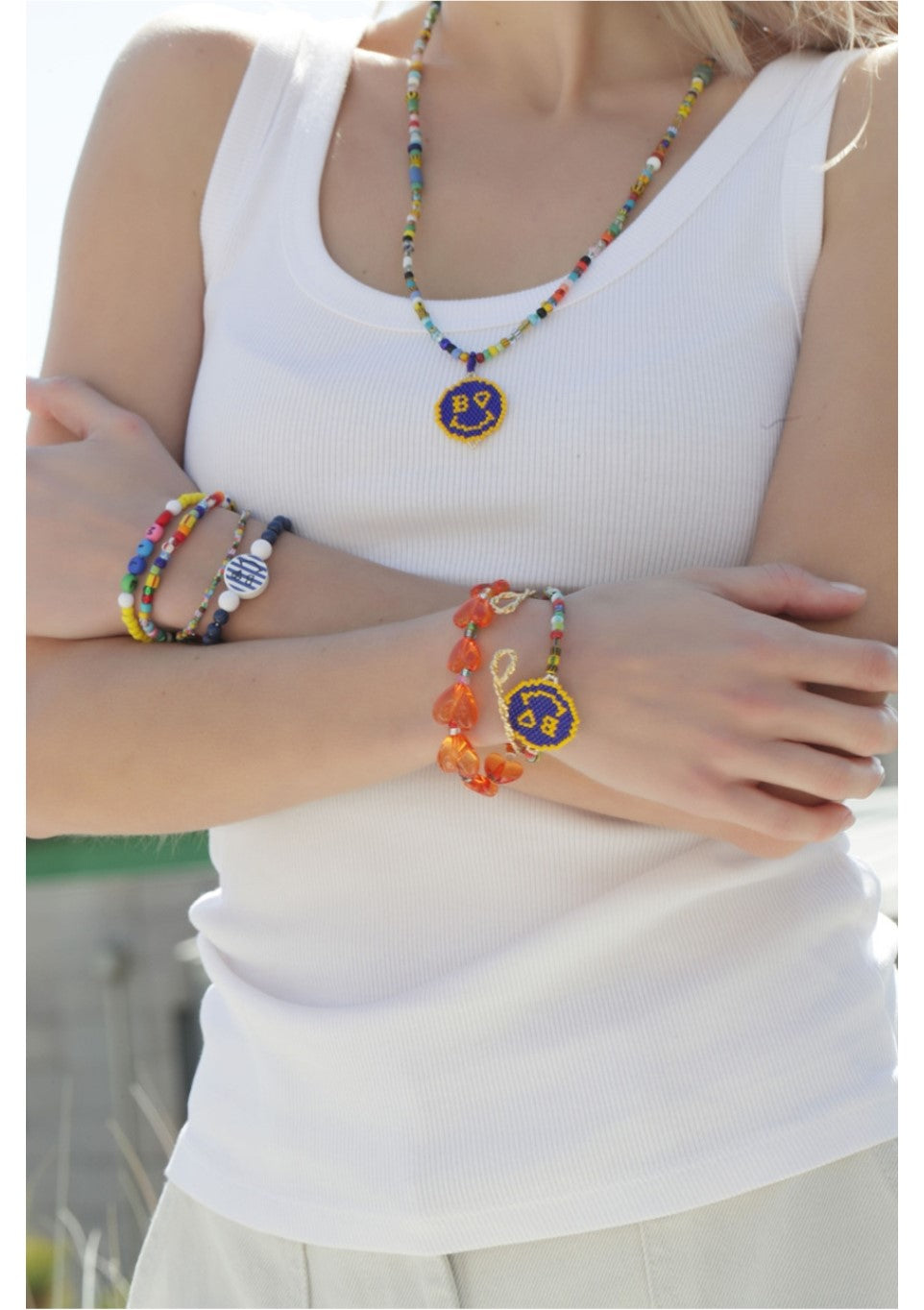 Model wearing Bonbo multicolor layered bead bracelet