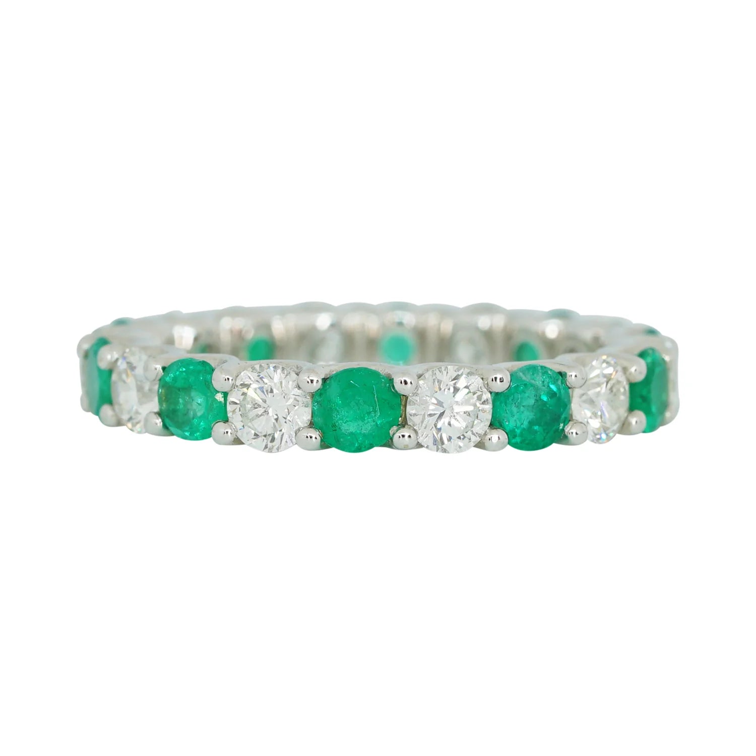 Alternating emerald and diamond eternity band in 18K white gold